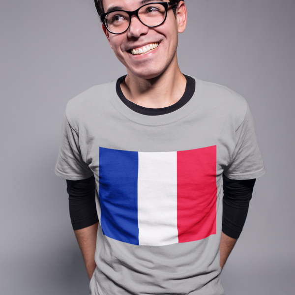 france-flag-smiling-nerd-guy-wearing-a-tshirt-mockup-in-a-gray-room-a19365