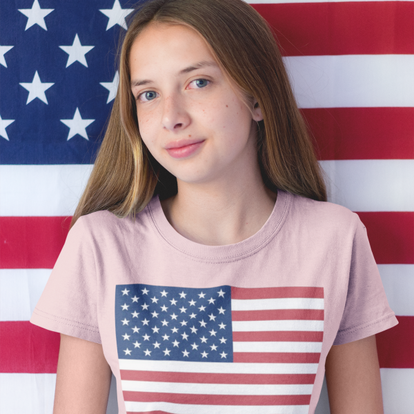 usa-flag-happy-teen-girl-wearing-a-t-shirt-mockup-with-an-american-flag-background-a20702